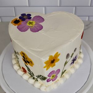 Pressed floral heart cake  at Plant Baked by Sarah in Baltimore
