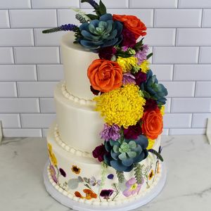 Colorful floral wedding cake  at Plant Baked by Sarah in Baltimore