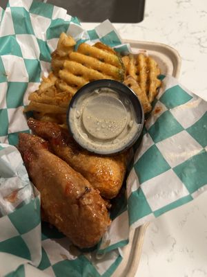 Their chicken wings and fries are SO GOOD but it was a $5 up charge for a water and fries and they forgot my water…didn’t realize till I got back to my hotel😒 at Twisted Plants in Milwaukee