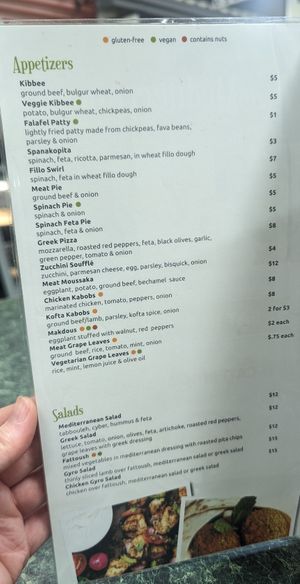 Menu with appetizers and salads. Green dots are vegan. at Foods of the Mediterranean in Allentown