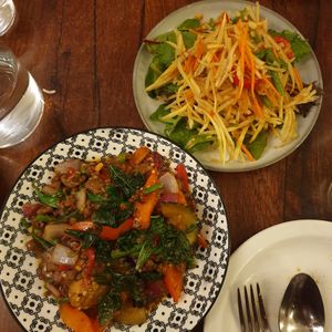 Aubergine Gra Pow and Som Tum Salad. Both delicious with a lovely spicy kick to them. at Plants of Roselyn in South East London