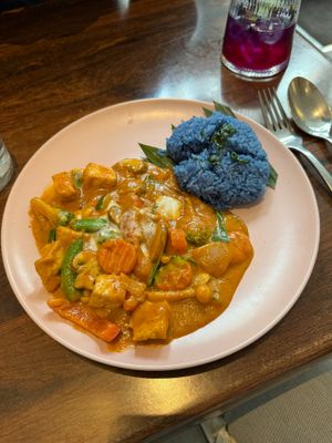Peanut satay tofu with butterfly pea sticky rice at Plants of Roselyn in South East London