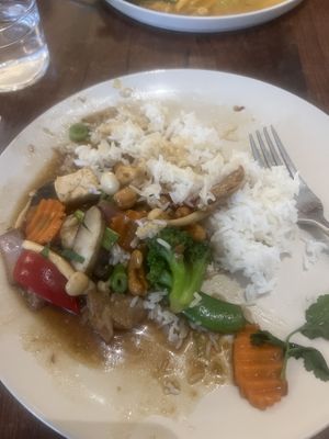 Already started eating! The cashew and chickn mains   at Plants of Roselyn in South East London