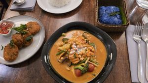 Corn cakes, Khmer curry, and butterfly rice at Plants of Roselyn in South East London