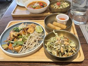 Pad Thai lunch tray - Pineapple curry lunch tray in the back  at Plants of Roselyn in South East London