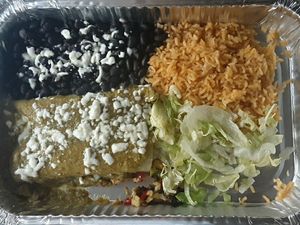 Veggie Enchiladas: 2 corn tortillas w/ mushrooms, carrots, bell peppers, onions, & zucchini, served w/ rice & whole black beans at Margaritas Kearney in Kearney