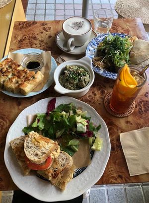 Foccacia, Pesto salad, Orange tonic, Chai latte, Cheese sandwich, eggplant dish/ salad at Rooted 루티드 in Seoul