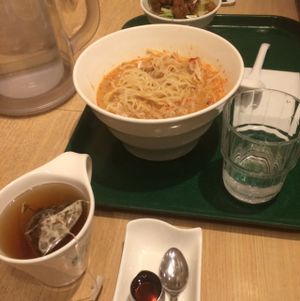 One of the hot ramens. tofu meat and rice. caramel tea at T's Tantan - Tokyo JR Station in Tokyo