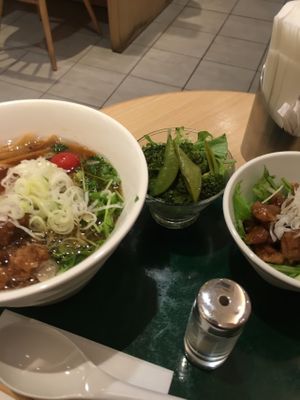 Bamboo shoot ramen with side of faux meat and pickled veggies at T's Tantan - Tokyo JR Station in Tokyo