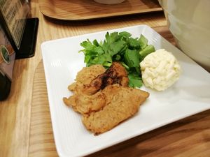 three toppings, soy meat, vegan cheese and coriander at T's Tantan - Tokyo JR Station in Tokyo