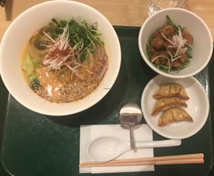 sesame ramen with dumpling and sticky soy  at T's Tantan - Tokyo JR Station in Tokyo