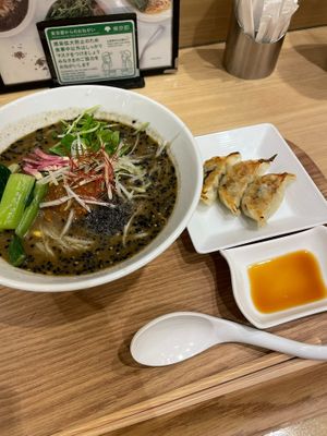 Black sesame ramen & Gyoza set at T's Tantan - Tokyo JR Station in Tokyo