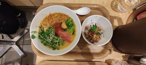 Alliums free white sesame ramen with additional rice and char siu at T's Tantan - Tokyo JR Station in Tokyo