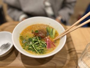 Golden ramen bowl  at T's Tantan - Tokyo JR Station in Tokyo