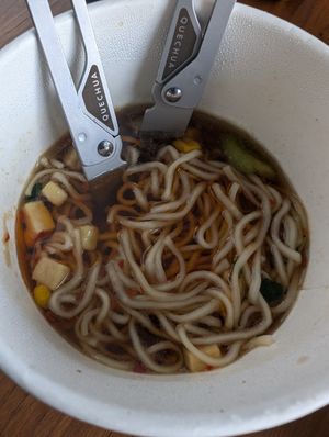 Hot and sour instant noodle pot at T's Tantan - Tokyo JR Station in Tokyo