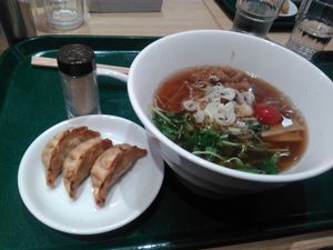 ramen and side of dumplings at T's Tantan - Tokyo JR Station in Tokyo