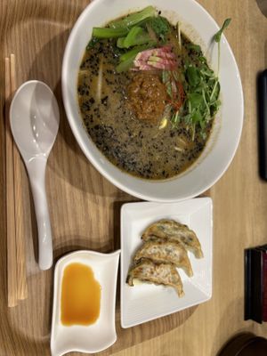Black sesame tantan and gyoza side  at T's Tantan - Tokyo JR Station in Tokyo