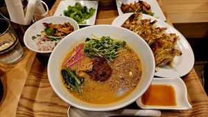Golden Sesame Ramen, Gyoza, and Soy meat on rice at T's Tantan - Tokyo JR Station in Tokyo