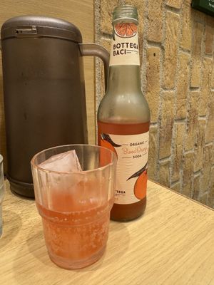 Organic blood orange lemonade.  at T's Tantan - Tokyo JR Station in Tokyo