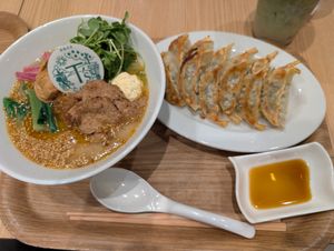 Golden sesame special ramen with gyoza at T's Tantan - Tokyo JR Station in Tokyo
