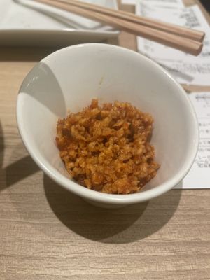 Crispy and spicy 180 Y  at T's Tantan - Tokyo JR Station in Tokyo