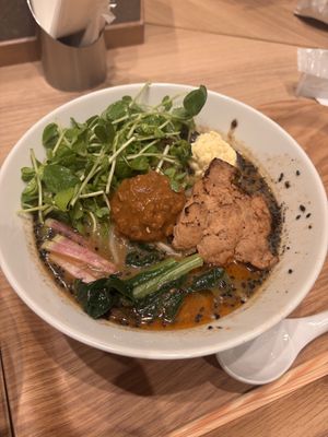 black sesame ramen  at T's Tantan - Tokyo JR Station in Tokyo