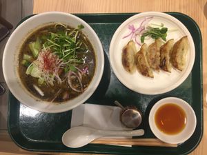 Black sesame Tantan with gyozas.   at T's Tantan - Tokyo JR Station in Tokyo