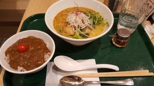 golden sesame ramen, curry side dish at T's Tantan - Tokyo JR Station in Tokyo
