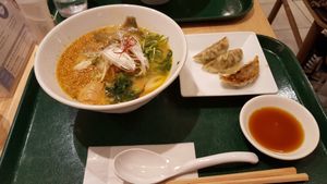 golden sesame ramen and gyoza at T's Tantan - Tokyo JR Station in Tokyo