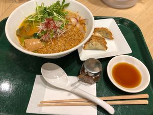 Gold sesame tantan with gyozas  at T's Tantan - Tokyo JR Station in Tokyo