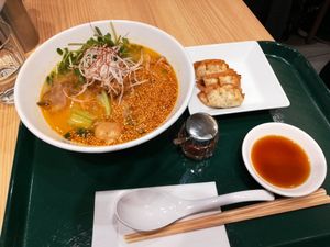 Gold sezame soup with gyoza at T's Tantan - Tokyo JR Station in Tokyo