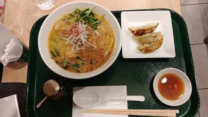 Golden Sesame TanTan + gyoza at T's Tantan - Tokyo JR Station in Tokyo