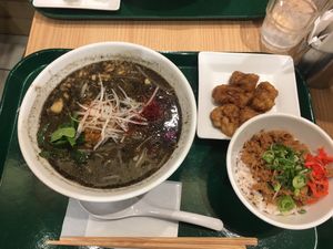 Black sesame ramen, chikn, and “beef” bowl.  at T's Tantan - Tokyo JR Station in Tokyo