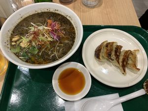 Black sesame ramen and veg gyoza at T's Tantan - Tokyo JR Station in Tokyo