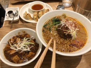 golden sesame with ma poo, plus gyoza at T's Tantan - Tokyo JR Station in Tokyo