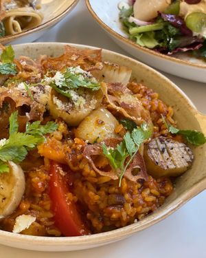 Paella with vegetables, lotus root chips, oyster mushroom  at Lazy Farmers in Seoul