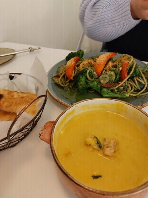 Pumpkin soup that comes with foccacia and pesto pasta at Lazy Farmers in Seoul