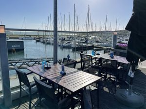 Terrace overlooking the harbour  at Havenpaviljoen De Dining in Oost-vlieland