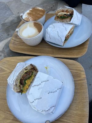 Muhammara Sandwich (top), Crispy Eggplant Sandwich (bottom), Chai Oat Latte and Dirty Chai Oat Latte  at Picnic in Sagres