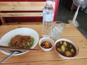Japanese curry, kimchi, and noodles and patty. at YinYin Vegan in Khon Kaen