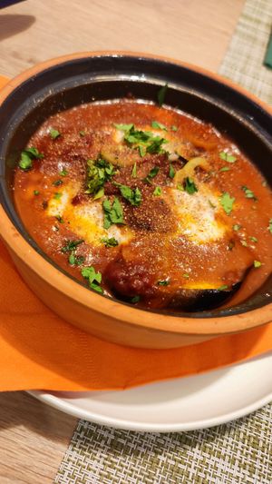 baked vegan feta and aubergine in tomato sauce - they come in spicy and normal versions at Veganissimo in Santorini