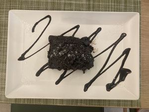 Vegan chocolate cake, really warm and freshly made 😍  at Veganissimo in Santorini