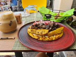 The best mushrooms I ate on santorini! Great texture and well flavoured. Difficult to spot this place, and outdoor seating is in a busy walkway but the staff are lovely too! at Veganissimo in Santorini