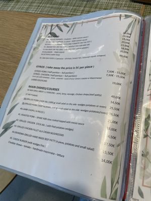 Menu… Meat, fish… 😢😏  at Veganissimo in Santorini