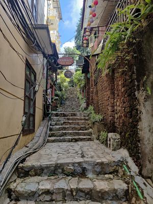 From the Sapa Center (or Ho Chi Minh monument as it appears in google maps) you can get to the restaurant through these stairs at Thong Dong Vegan Kitchen & Cafe in Lao Cai