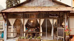 outside at Thong Dong Vegan Kitchen & Cafe in Lao Cai