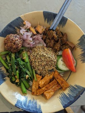 Colourful rice with mushrooms, tofu, "falafel" and tasty veggies at Thong Dong Vegan Kitchen & Cafe in Lao Cai