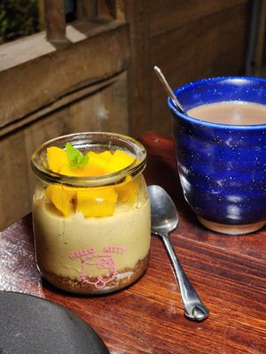 Mango cheesecake and hot chocolate at Thong Dong Vegan Kitchen & Cafe in Lao Cai