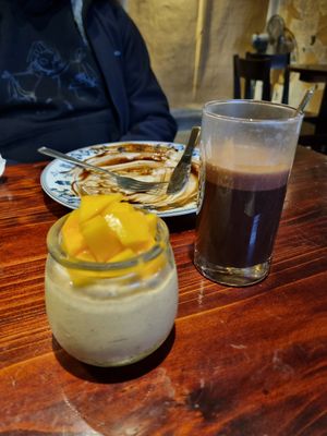 Mango cheesecake & chocolate coffee at Thong Dong Vegan Kitchen & Cafe in Lao Cai