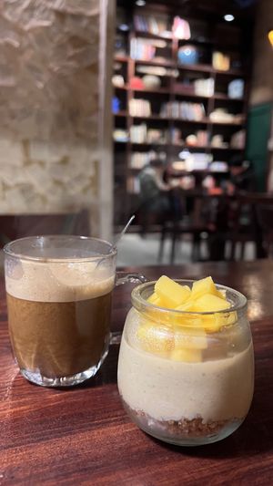 Caffe with dates and cheesecake  at Thong Dong Vegan Kitchen & Cafe in Lao Cai